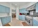 Beautiful kitchen with a stainless steel oven and range, and open to a cozy living area at 8180 E Shea Blvd # 1019, Scottsdale, AZ 85260