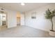 Inviting bedroom featuring neutral carpet, and an ensuite bathroom at 909 S Acapulco Ln # A, Tempe, AZ 85281