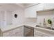 Well-lit kitchen featuring new countertops, stainless steel appliances, and plenty of storage space at 909 S Acapulco Ln # A, Tempe, AZ 85281