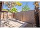 Enclosed patio with concrete pavers and a wooden gate for privacy at 909 S Acapulco Ln # A, Tempe, AZ 85281