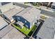 Aerial view of the home with artificial turf and a small putting green in the backyard at 9352 E Saturn Ave, Mesa, AZ 85212