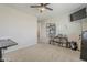Spacious bedroom featuring a ceiling fan and ample natural light at 9352 E Saturn Ave, Mesa, AZ 85212