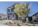 Attractive two-story home with a two-car garage and a beautifully landscaped front yard at 9352 E Saturn Ave, Mesa, AZ 85212