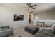 Inviting living room with modern decor and a view into the adjoining room at 9352 E Saturn Ave, Mesa, AZ 85212