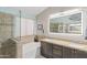 Modern bathroom with a tub, glass shower, double sinks, and a vanity at 10333 E Gold Nugget Ct, Gold Canyon, AZ 85118