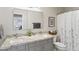 Bathroom featuring double sinks, granite counters, large mirror and stylish shower curtain at 10333 E Gold Nugget Ct, Gold Canyon, AZ 85118