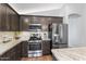Well-equipped kitchen with stainless steel appliances and ample countertop space at 10333 E Gold Nugget Ct, Gold Canyon, AZ 85118