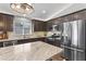 Modern kitchen featuring stainless steel appliances and granite countertops at 10333 E Gold Nugget Ct, Gold Canyon, AZ 85118