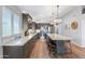 Open kitchen with expansive counters, pendant lights and modern appliances at 10333 E Gold Nugget Ct, Gold Canyon, AZ 85118