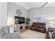 Cozy living room with stylish furniture, a large TV, and decorative elements at 10333 E Gold Nugget Ct, Gold Canyon, AZ 85118