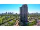 Stunning aerial view showcasing the high rise building with surrounding city skyline and beautiful landscape with swimming pool at 1040 E Osborn Rd # 501, Phoenix, AZ 85014
