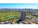 Scenic view of a luxurious high-rise apartment complex overlooking the city and a golf course at 1040 E Osborn Rd # 501, Phoenix, AZ 85014