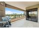 Outdoor balcony featuring a grill and overlooking scenic cityscape and golf course views, ideal for relaxation at 1040 E Osborn Rd # 501, Phoenix, AZ 85014