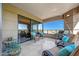 Balcony featuring comfortable seating, a barbecue grill, and views of the city skyline at 1040 E Osborn Rd # 501, Phoenix, AZ 85014