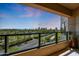 Spectacular balcony view of the Phoenix skyline, lush landscaping, and the green fairways of the golf course at 1040 E Osborn Rd # 501, Phoenix, AZ 85014