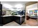 Sleek bathroom with large vanity, full wall mirror, and view to main bedroom and closet at 1040 E Osborn Rd # 501, Phoenix, AZ 85014