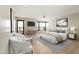Serene bedroom featuring a plush bed, contemporary decor, and a balcony access with natural light and relaxing views at 1040 E Osborn Rd # 501, Phoenix, AZ 85014