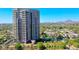 High-rise condo featuring large balconies with views of the mountains and city skyline at 1040 E Osborn Rd # 501, Phoenix, AZ 85014