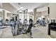 Well-equipped gym featuring modern exercise machines, mirrors, and ample workout space at 1040 E Osborn Rd # 501, Phoenix, AZ 85014