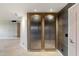 Hallway with concealed modern storage, combining function with contemporary design for an elegant space at 1040 E Osborn Rd # 501, Phoenix, AZ 85014