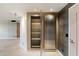 Hallway with unique storage solutions, combining style and functionality for organized living and decor at 1040 E Osborn Rd # 501, Phoenix, AZ 85014