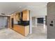 Sleek kitchen with granite countertops, light wood cabinets, and stainless appliances; a chef's delight at 1040 E Osborn Rd # 501, Phoenix, AZ 85014