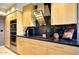 Modern kitchen features sleek cabinets, stainless steel appliances, and an overhead hood, perfect for cooking at 1040 E Osborn Rd # 501, Phoenix, AZ 85014