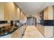 Modern kitchen boasts sleek cabinets, dark countertops, stainless steel appliances, and ample counter space at 1040 E Osborn Rd # 501, Phoenix, AZ 85014