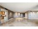 Large open-concept living space with tile floors and neutral walls is ready for your personal touch at 1040 E Osborn Rd # 501, Phoenix, AZ 85014