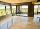 Spacious living room featuring large windows and a balcony with a grill, offering city views at 1040 E Osborn Rd # 501, Phoenix, AZ 85014