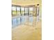 Bright living room boasts stone tiled flooring and access to a private balcony overlooking scenic views at 1040 E Osborn Rd # 501, Phoenix, AZ 85014