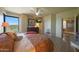Cozy main bedroom with golf course views, comfortable furnishings and warm decor at 1040 E Osborn Rd # 501, Phoenix, AZ 85014