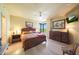 Comfortable main bedroom with a ceiling fan and relaxing ambiance at 1040 E Osborn Rd # 501, Phoenix, AZ 85014