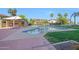 Gorgeous community pool surrounded by lush landscaping and comfortable lounge chairs at 1040 E Osborn Rd # 501, Phoenix, AZ 85014