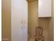A beige storage room with a cushioned chair at 1040 E Osborn Rd # 501, Phoenix, AZ 85014