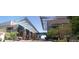 Exterior shot of the building with decorative design, well-kept landscaping, and street view at 1040 E Osborn Rd # 501, Phoenix, AZ 85014