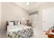 Cozy bedroom with a comfortable bed, neutral tones, and ample closet space at 11206 W Sieno Pl, Avondale, AZ 85392