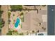 Aerial view of home with private pool, desert landscaping, and spacious backyard at 11312 E Enrose St, Mesa, AZ 85207