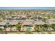 An aerial view showing a beautiful neighborhood with well-maintained homes and desert landscaping at 11312 E Enrose St, Mesa, AZ 85207