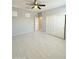 Bright bedroom with tile floors, ceiling fan, closet with sliding doors at 1241 E Palo Verde Dr, Casa Grande, AZ 85122