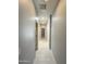 Hallway shows doorways leading to various rooms at 1241 E Palo Verde Dr, Casa Grande, AZ 85122