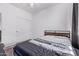 Bedroom featuring dark gray flooring, bed, and a closet at 1405 E Aloe Dr, Chandler, AZ 85286