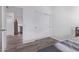 A bedroom with wood-look floors and a sliding door closet at 1405 E Aloe Dr, Chandler, AZ 85286