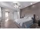 Comfortable main bedroom features hardwood floors, lots of natural light, and an en-suite bathroom at 1405 E Aloe Dr, Chandler, AZ 85286