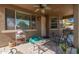 Covered patio with outdoor furniture, a ceiling fan, and a view of the backyard at 1405 E Aloe Dr, Chandler, AZ 85286