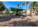 Community playground featuring a shaded play structure, perfect for Gathering fun at 1405 E Aloe Dr, Chandler, AZ 85286