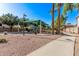 Community playground with covered play structures, benches, and walking paths at 1405 E Aloe Dr, Chandler, AZ 85286