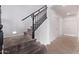Staircase features carpeted treads, contrasting trim and tile entry at 1405 E Aloe Dr, Chandler, AZ 85286