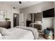 Comfortable bedroom with a large mirror and access to the kitchen at 1411 E Orangewood Ave # 233, Phoenix, AZ 85020