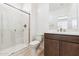 Modern bathroom features a glass enclosed shower, a vanity, and a toilet at 15389 W Cottontail Ln, Surprise, AZ 85387
